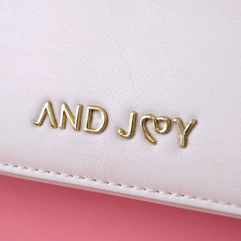 Le sac - And Joy - Logo métal
